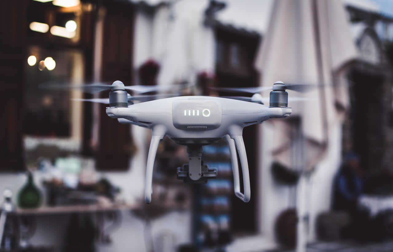 Drone hovering in an urban setting